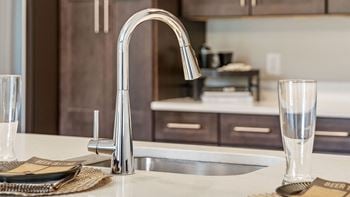 Quartz countertop in kitchen and bathrooms